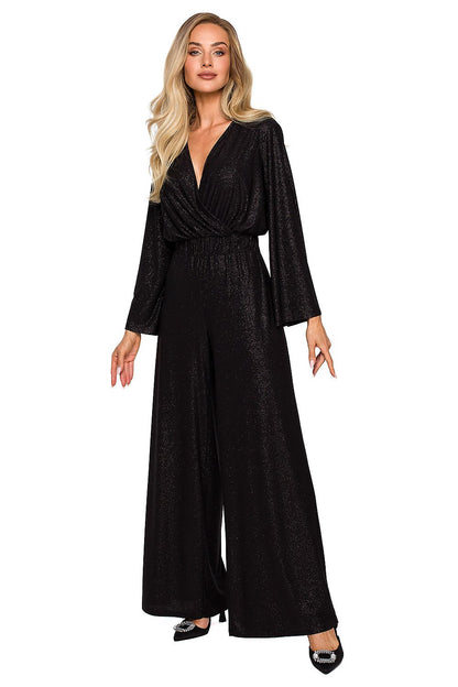 Glamorous black brocade trim jumpsuit with a deep V-neckline, wide legs, and elegant styling for evening wear.