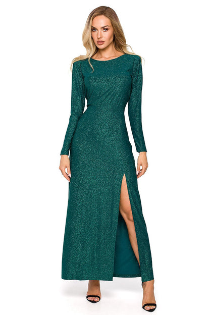 Chic long evening dress by Moe, featuring a shimmering brocade fabric, a leg slit, and elegant long sleeves, perfect for special occasions.