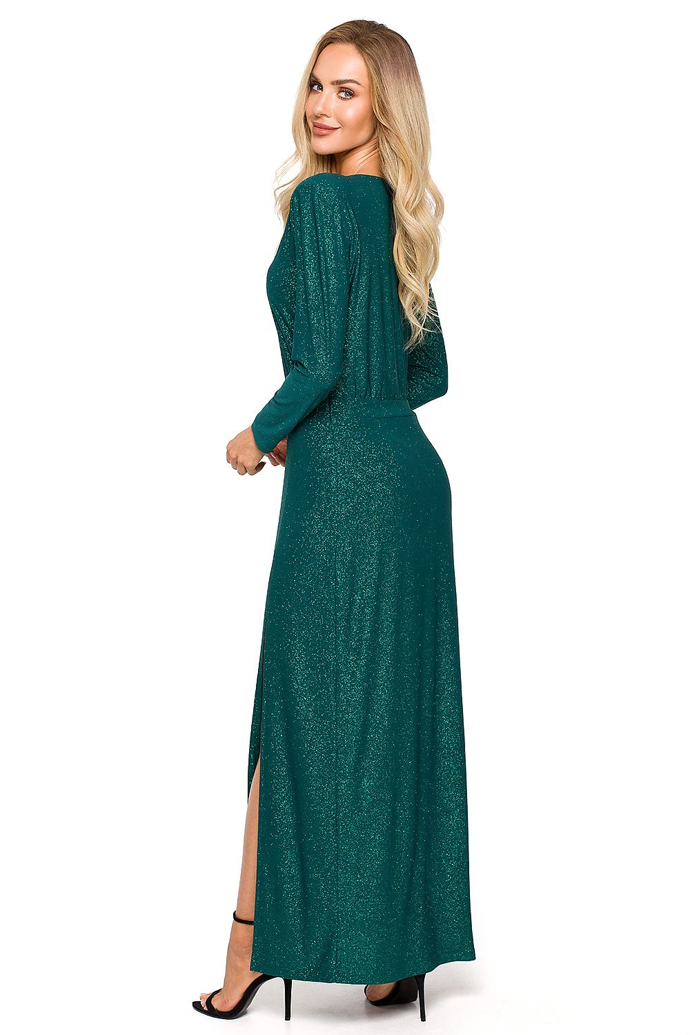 Stylish rear view of a long evening dress by Moe, made from shimmering brocade, showcasing a flattering silhouette and leg slit.