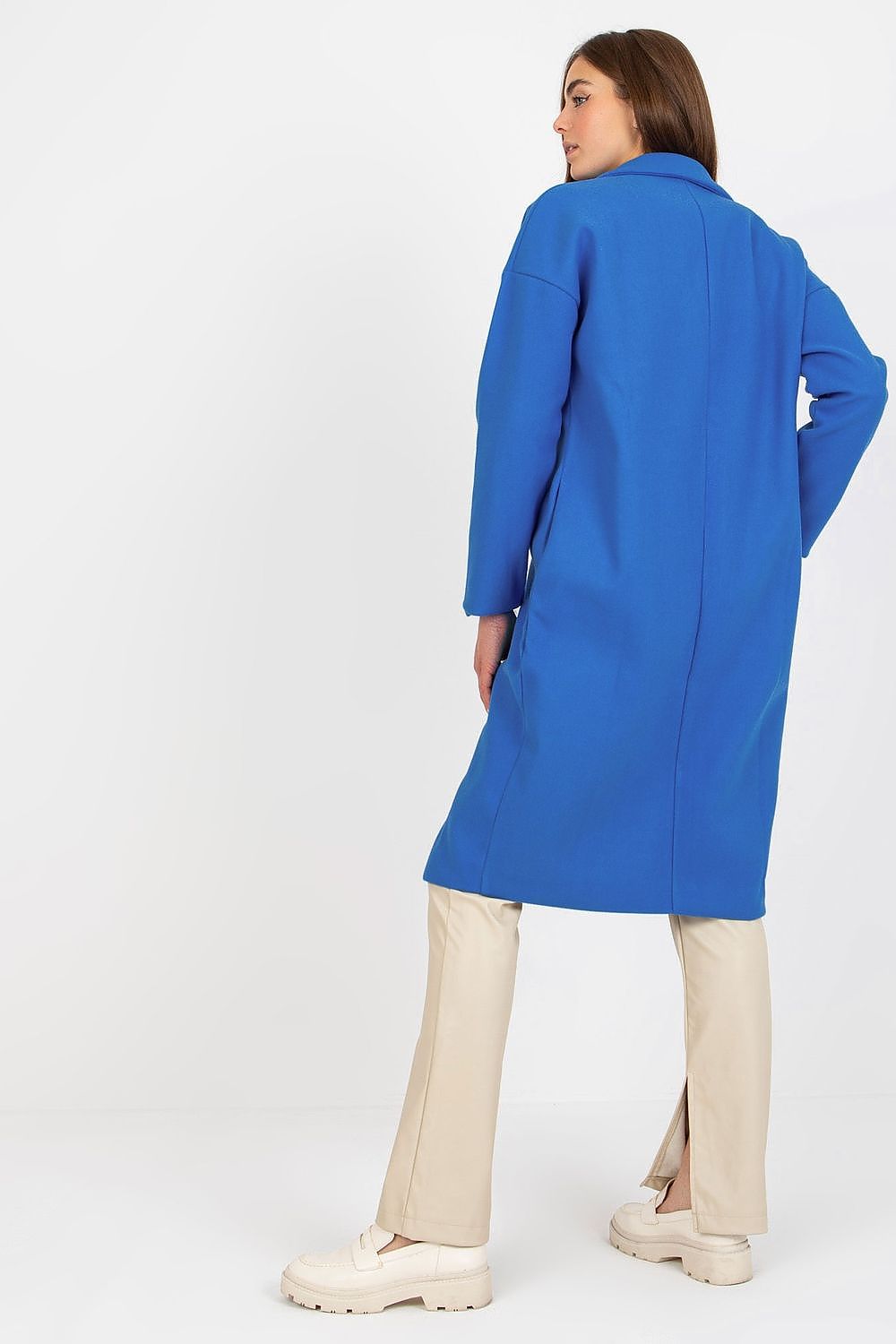 Back view of a luxury women's single-breasted coat in stunning blue, highlighting its sophisticated design and fully lined interior, perfect for any elegant outfit.