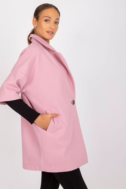 Elegant pink women's loose cut coat by Rue Paris, featuring a stylish button closure and practical side pockets, showcasing a sophisticated look.