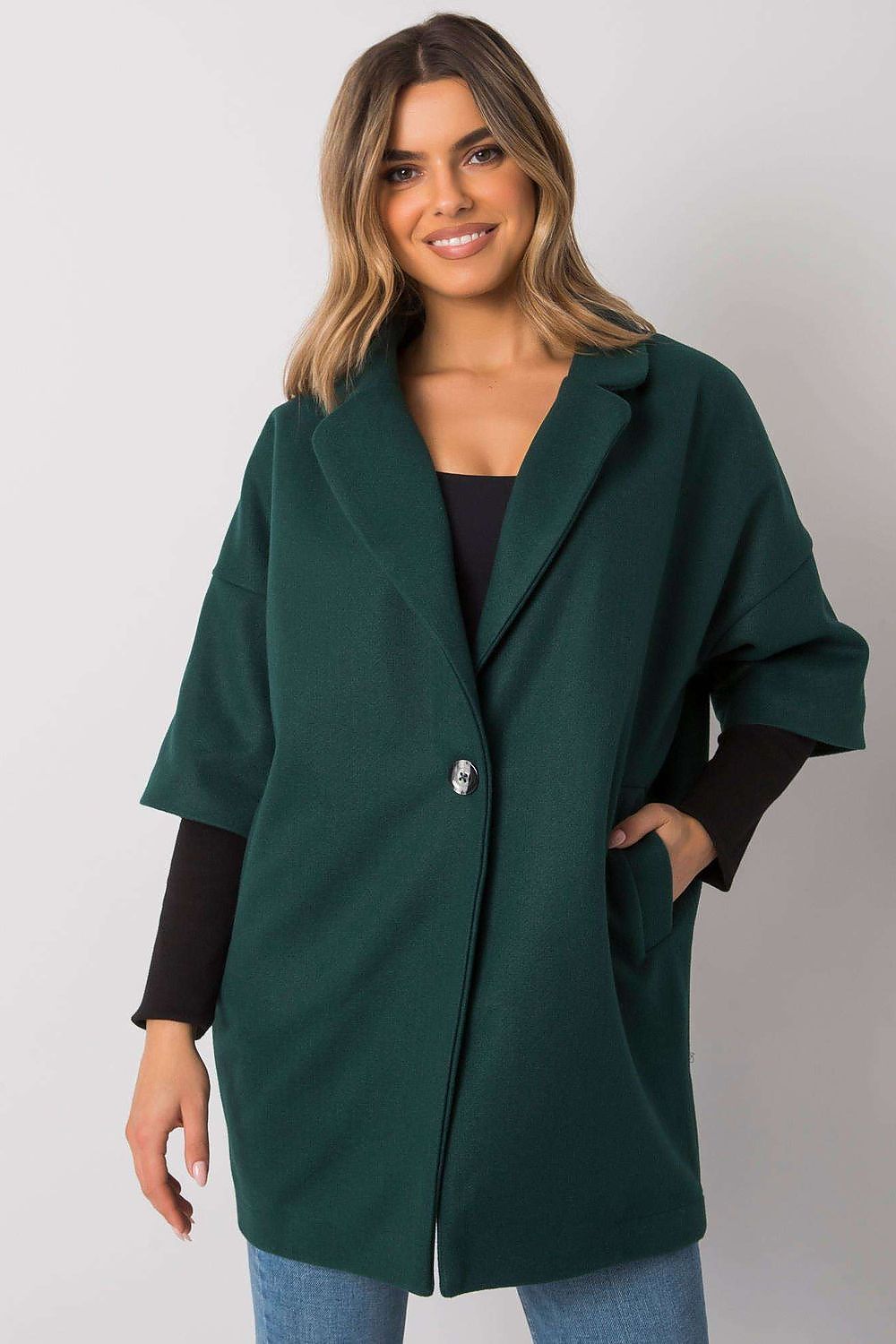 Front view of a luxurious green women's coat by Rue Paris, showing a button closure and relaxed silhouette, perfect for chic styling.