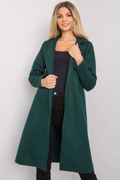 Luxurious green unlined long-sleeved coat for women by Rue Paris, featuring elegant collar and side pockets, styled with black outfit.