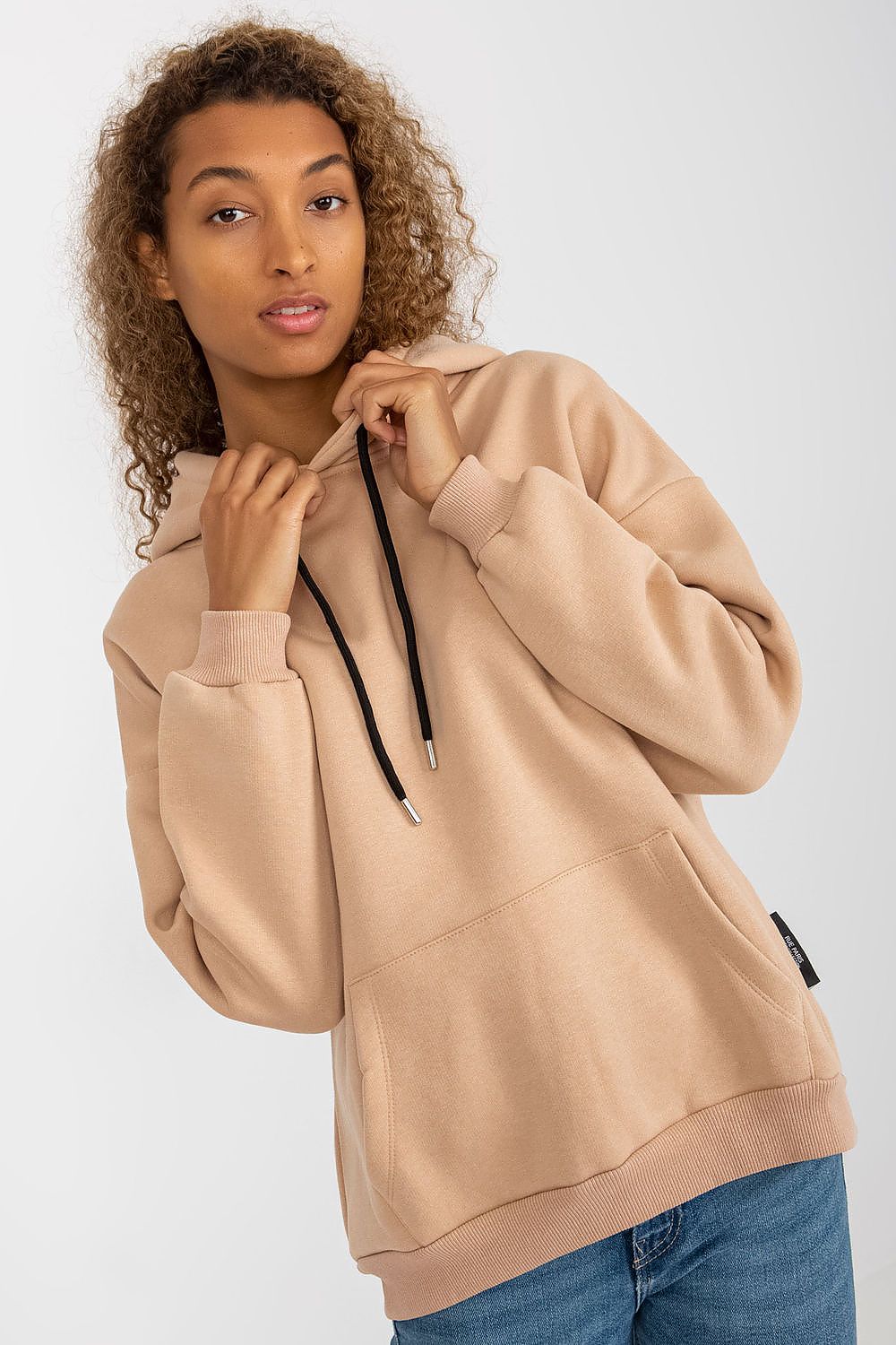 Luxury women's cotton blend hoodie sweatshirt from Rue Paris, featuring a hood and kangaroo pocket, styled elegantly with a model showing a chic pose.