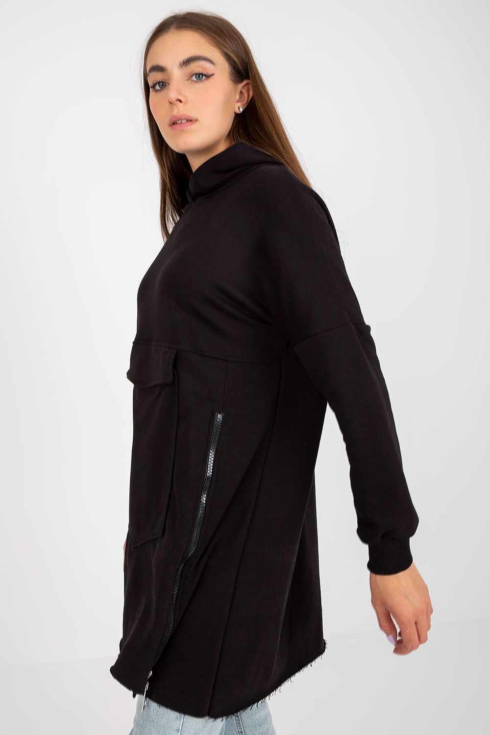 Luxury extended cut black cotton sweatshirt featuring decorative zippers and a spacious front pocket, worn elegantly with long sleeves and a stylish hood.