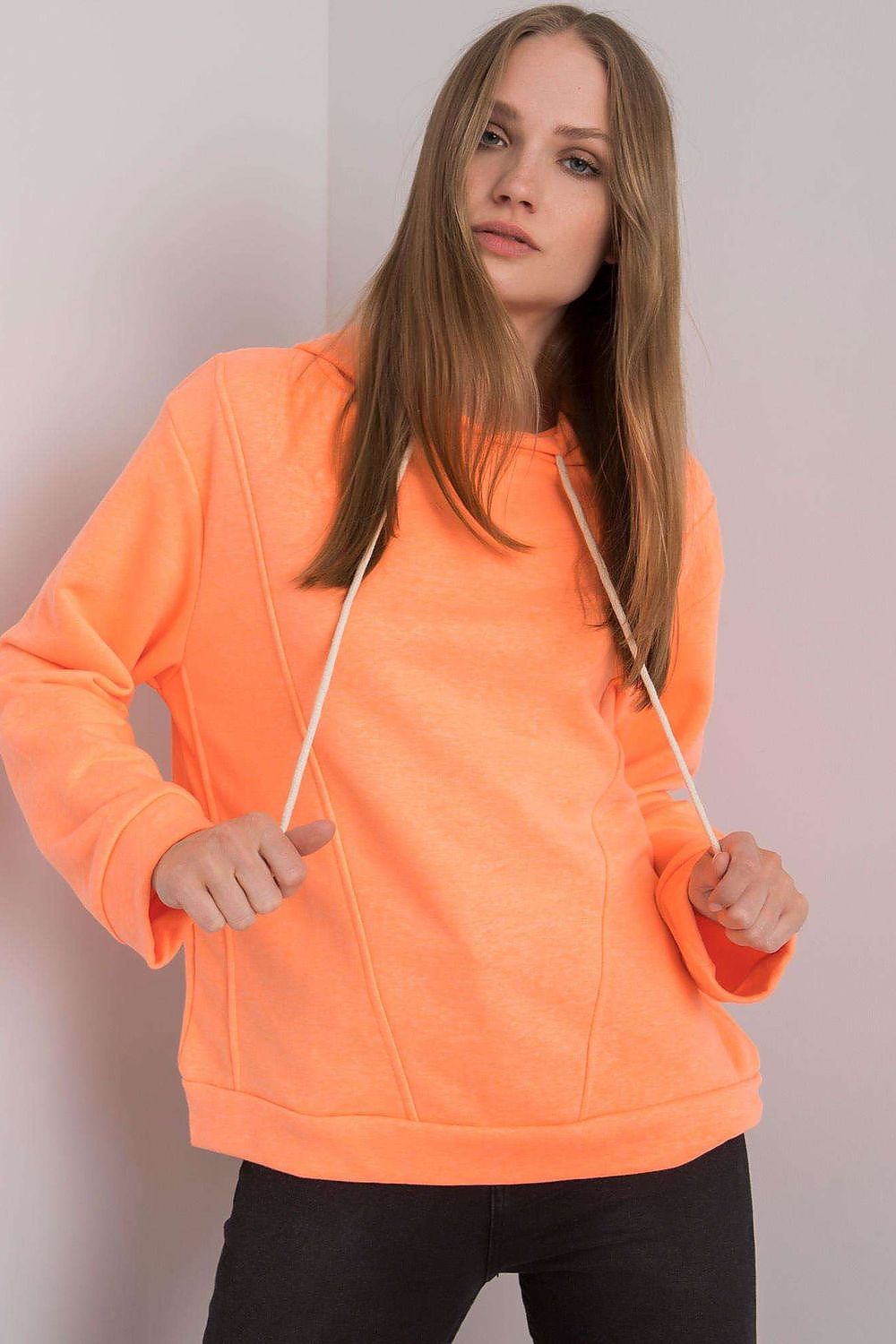 Vibrant neon orange women's cotton blend hoodie sweatshirt, elegantly designed with long sleeves and drawstrings for a trendy look.