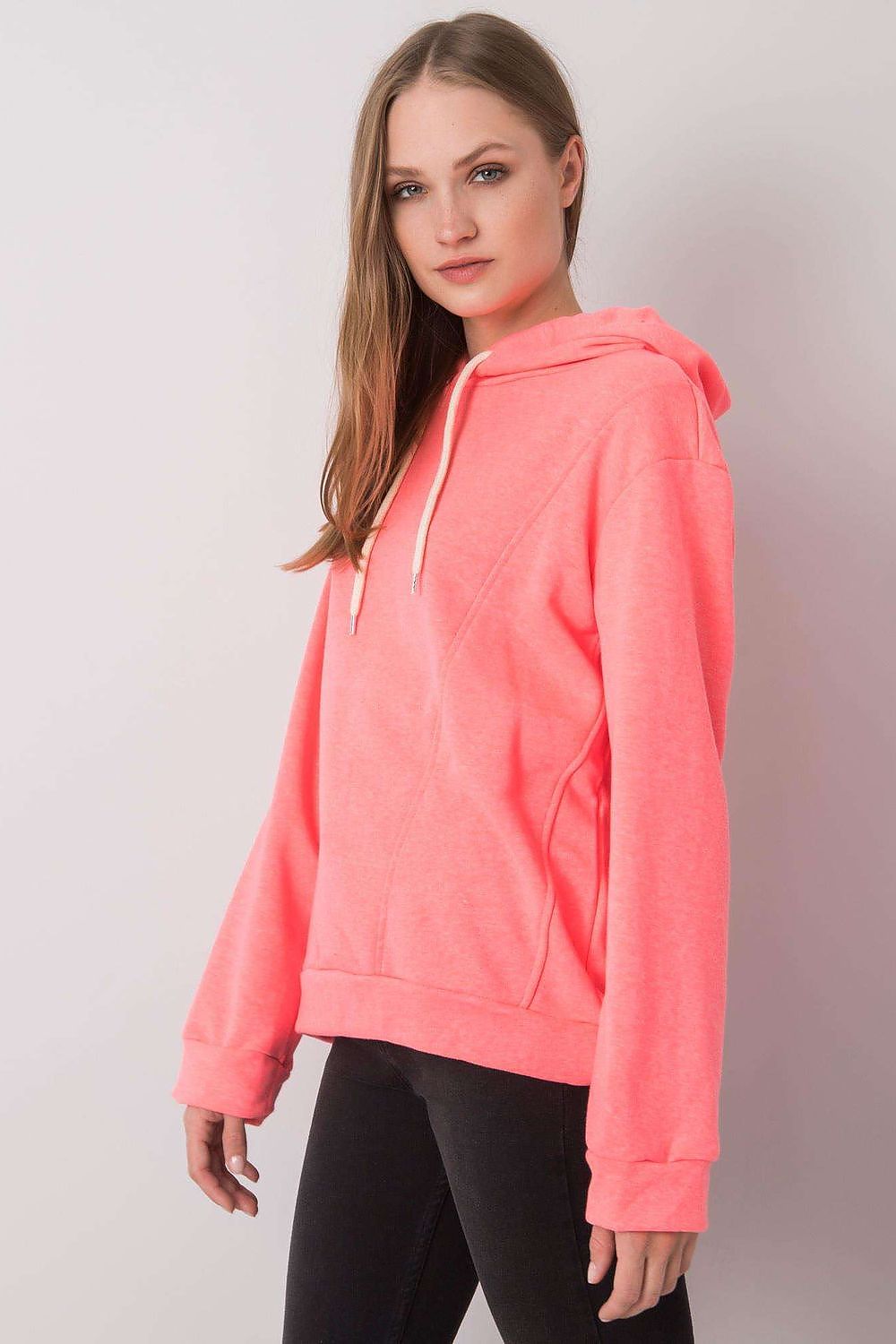 Fashion-forward women's hoodie sweatshirt in a radiant pink hue, designed with long sleeves and a modern silhouette by Ex Moda, ideal for stylish everyday attire.