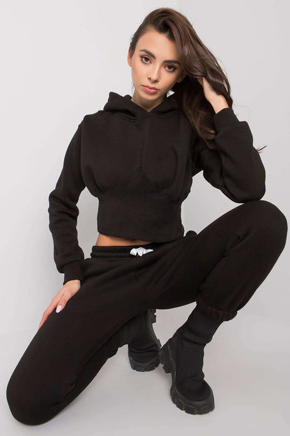 Elegant black version of the Ex Moda women's luxe 2-piece sweatshirt set, featuring a cropped hoodie and long pants for a chic and modern style.