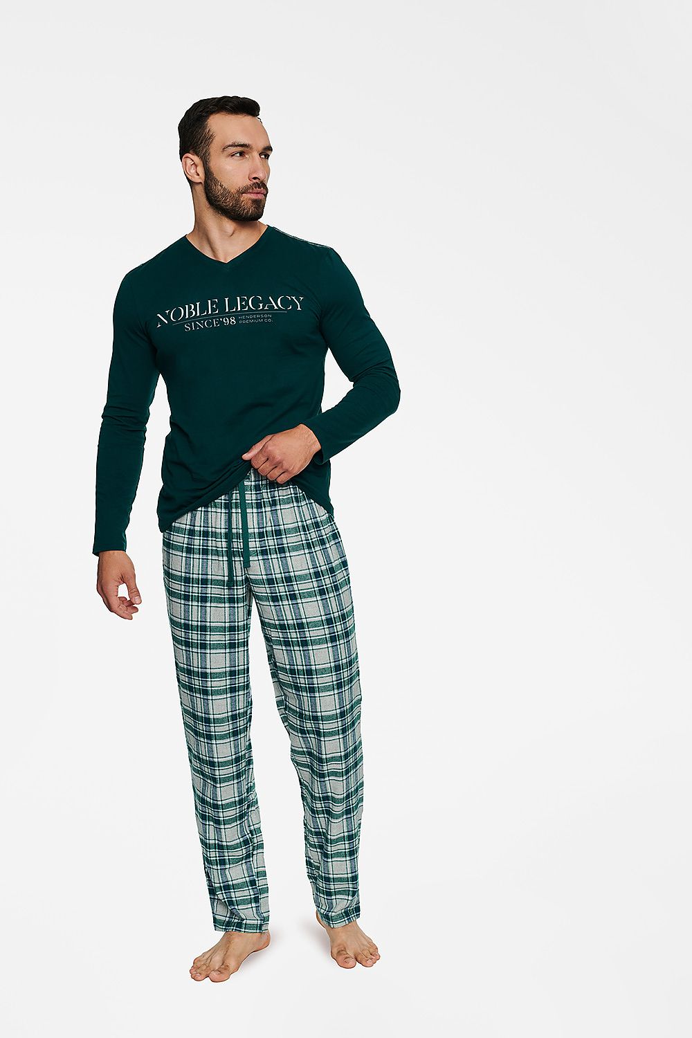 Luxury men's cotton pyjama set featuring a long-sleeve V-neck blouse in deep green with elegant stitching, paired with stylish plaid flannel pants, perfect for achieving a sophisticated night's sleep.