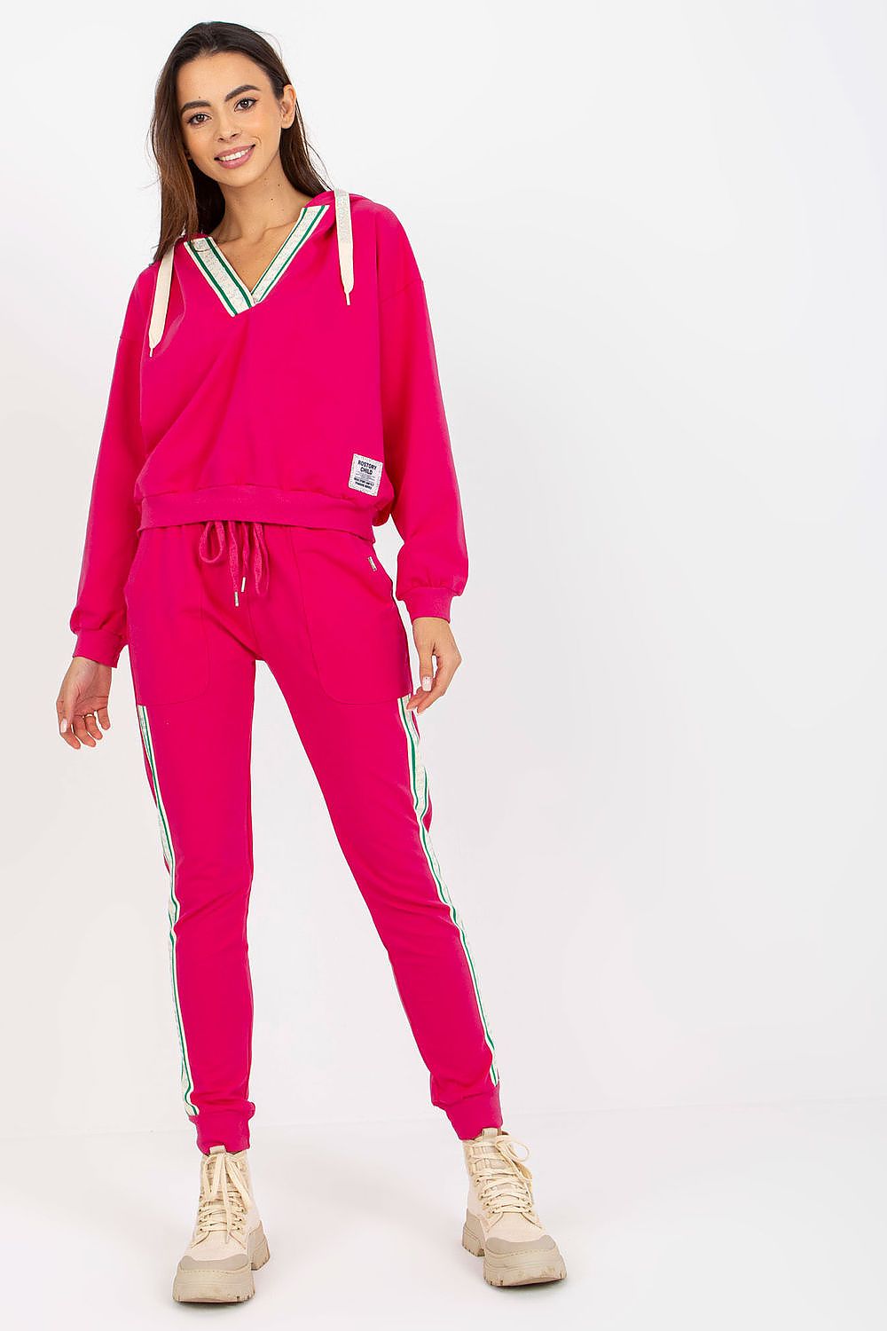 Luxurious pink cotton-blend hoodie sweatshirt set, featuring long sleeves, a hood, and stylish pants with slip pockets, exuding comfort and elegance.