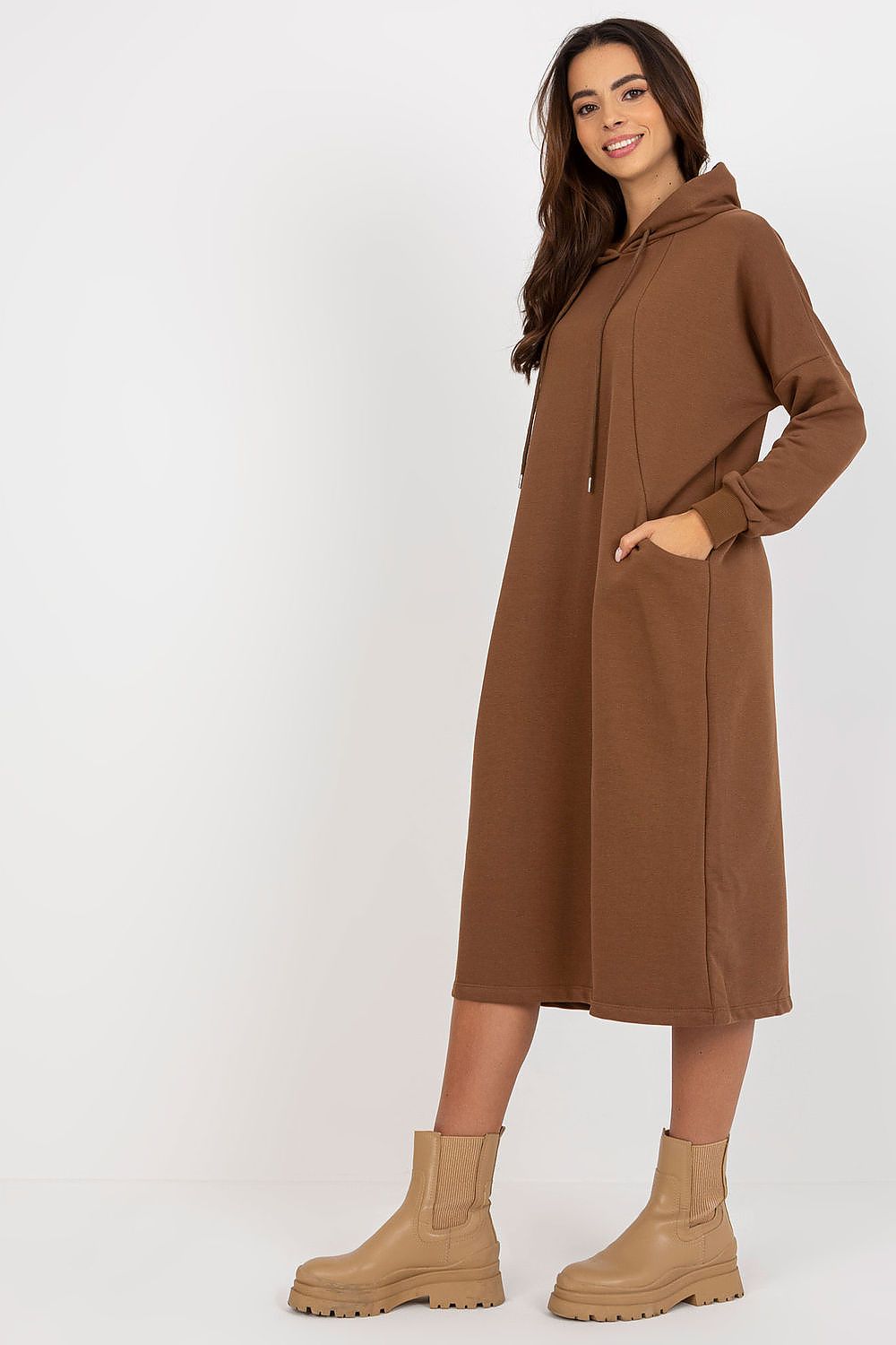 Stylish loose-fit brown cotton spandex hooded dress showcased in a sophisticated pose, embodying casual luxury.