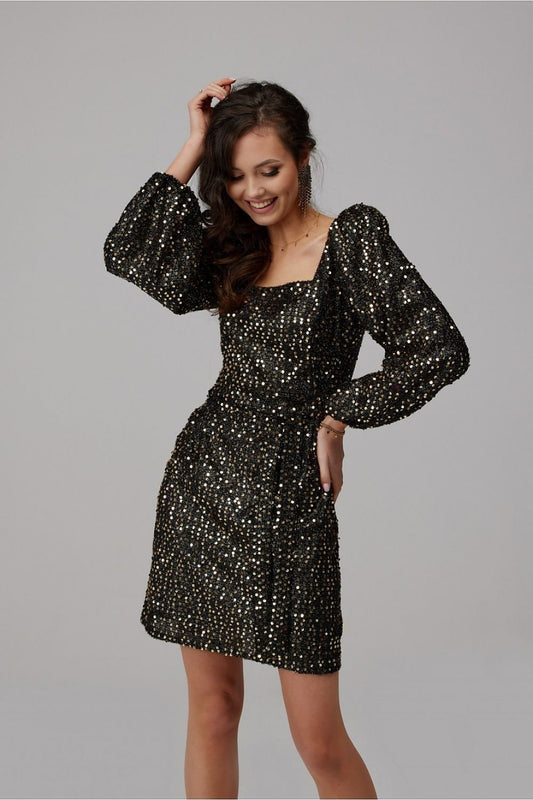 Chic black sequin mini dress with voluminous puff sleeves, tailored for a glamorous look, highlighting sophistication and style.