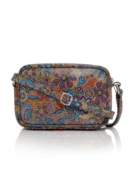 Chic natural leather women's handbag showcasing an intricate colourful flower design, featuring an adjustable strap, perfect for complementing any fashionable outfit.