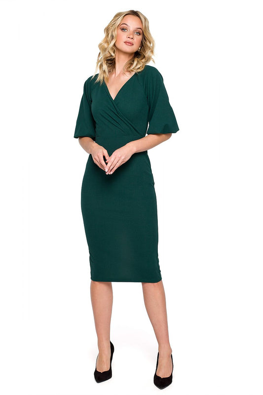 Elegant off-shoulder evening dress in rich green, showcasing a flattering mini length and decorative zipper, perfect for special occasions.