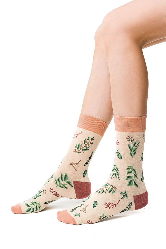 Luxury floral pattern cotton socks in soft pastel tones, featuring delicate leaf designs and a stylish solid colour cuff, perfect for combining comfort and elegance.