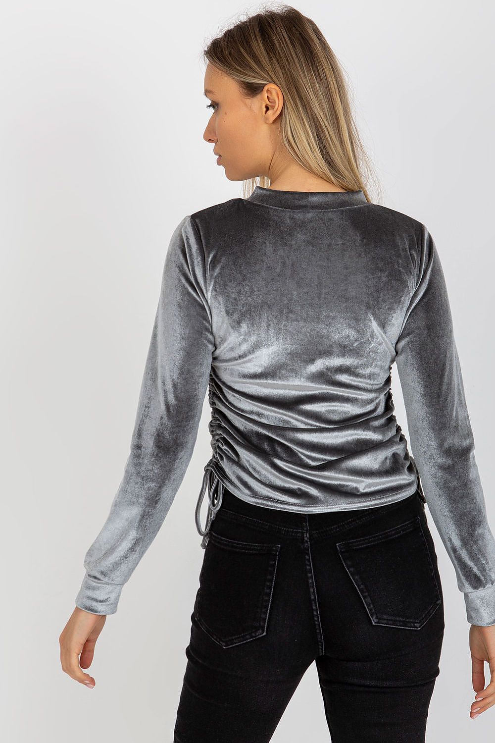Elegant grey velour blouse with long sleeves and adjustable side ties, showcasing a sophisticated back view, perfect for a luxurious wardrobe.