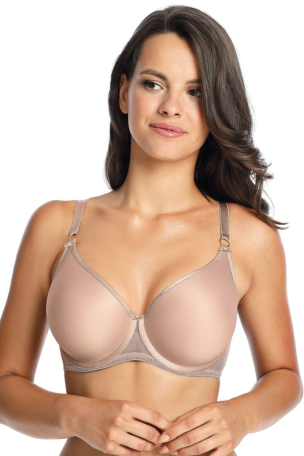 Model displaying a stunning beige seamless bra with thermally molded cups for optimal support and flattering tulip-shaped cleavage.