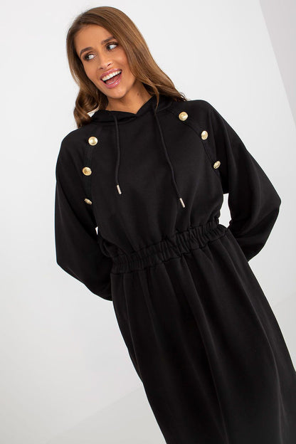 Elegant black casual cotton hoodie dress with long sleeves, adorned with decorative buttons, perfect for stylish everyday wear.