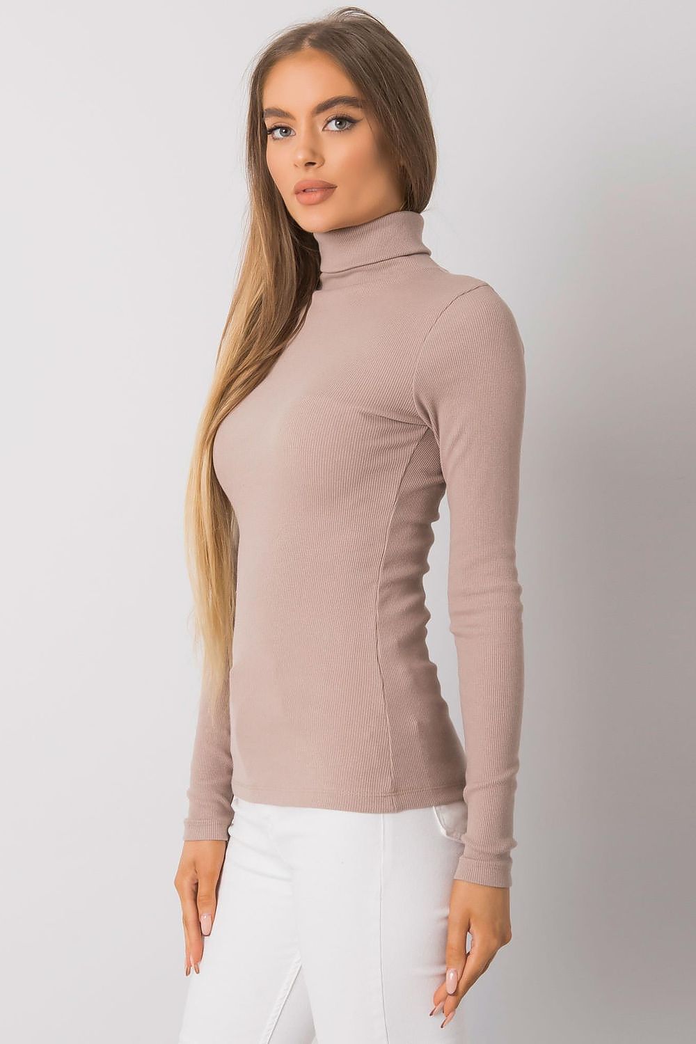 Stylish fitted cotton turtleneck in soft beige, highlighting a form-hugging design with long sleeves, perfect for layering.