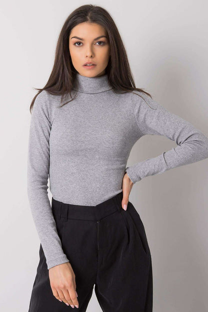 Chic grey fitted turtleneck, featuring long sleeves and a refined silhouette, ideal for exquisite autumn and winter outfits.