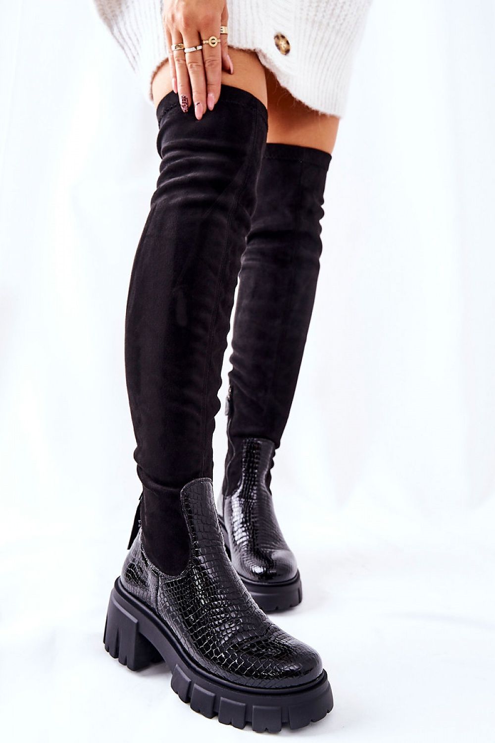 Elegant Maciejka thigh-high boots in black leather and suede, featuring a stylish decorative design and a comfortable chunky sole, perfect for a chic and fashionable look.