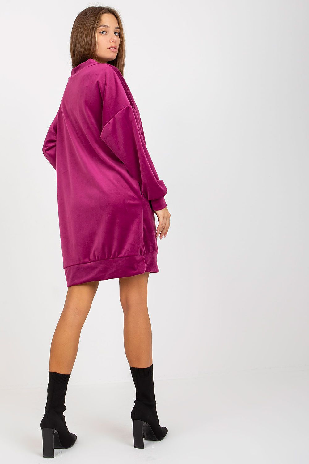 Elegant short velour dress in rich magenta, featuring long sleeves and an oversized silhouette, perfect for chic everyday wear.