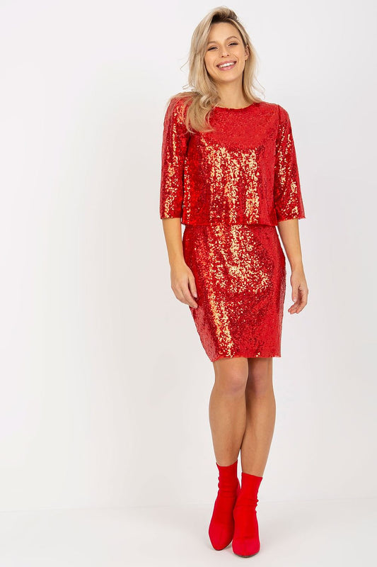 Stylish model showcasing a sophisticated red sequined pencil skirt and crop top, perfect for upscale evening occasions.