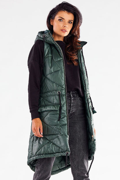 Chic green quilted hooded gilet by Awama, perfect for transitional weather, showcasing stylish design and comfort.