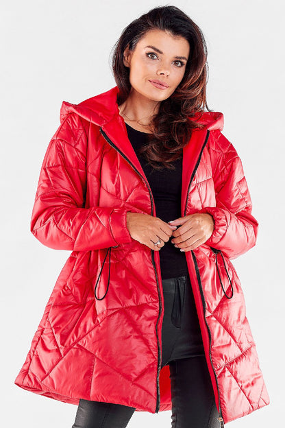 Elegant woman wearing a luxury red quilted hooded jacket, showcasing its stylish adjustable waist and zippered design, perfect for adding a chic layer to any outfit.