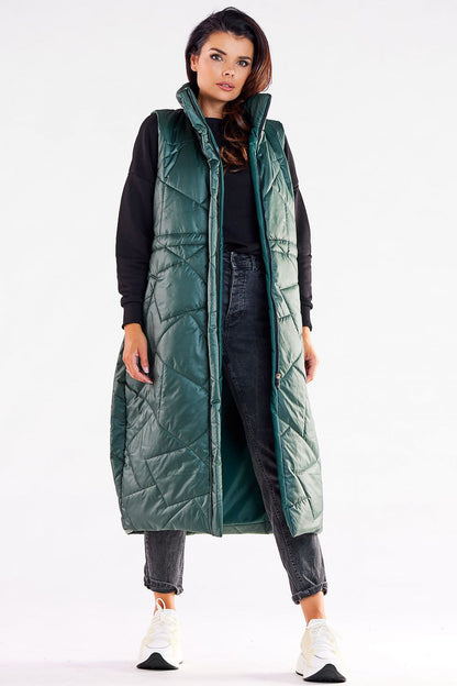 Chic green oversized vest, featuring a flattering design with adjustable waist. Luxurious fully lined fabric ideal for fashionable autumn layering.