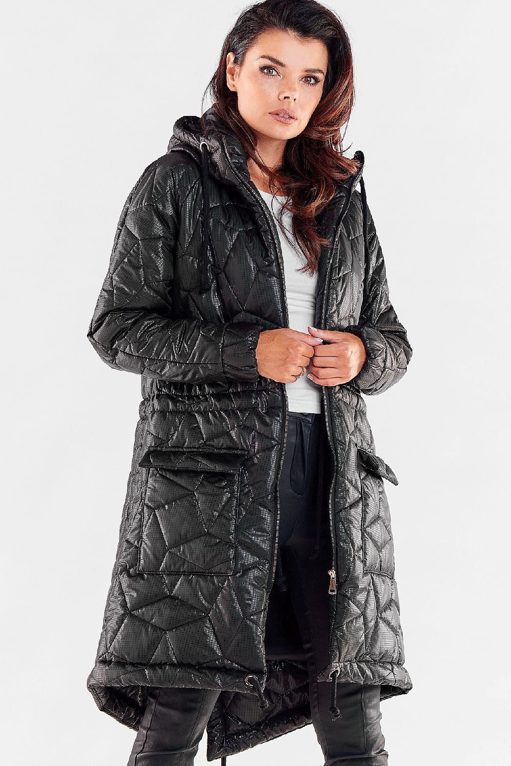 Sophisticated black quilted knee-length jacket with drawstring waist and hood, perfect for a classy yet practical winter outfit.