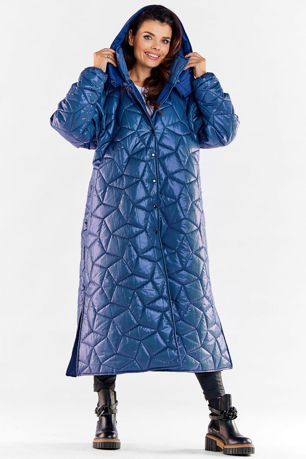 Elegant luxury long quilted hooded coat in blue, featuring ribbed sleeves, knee slit, and stylish design, perfect for effortless movement and winter warmth.