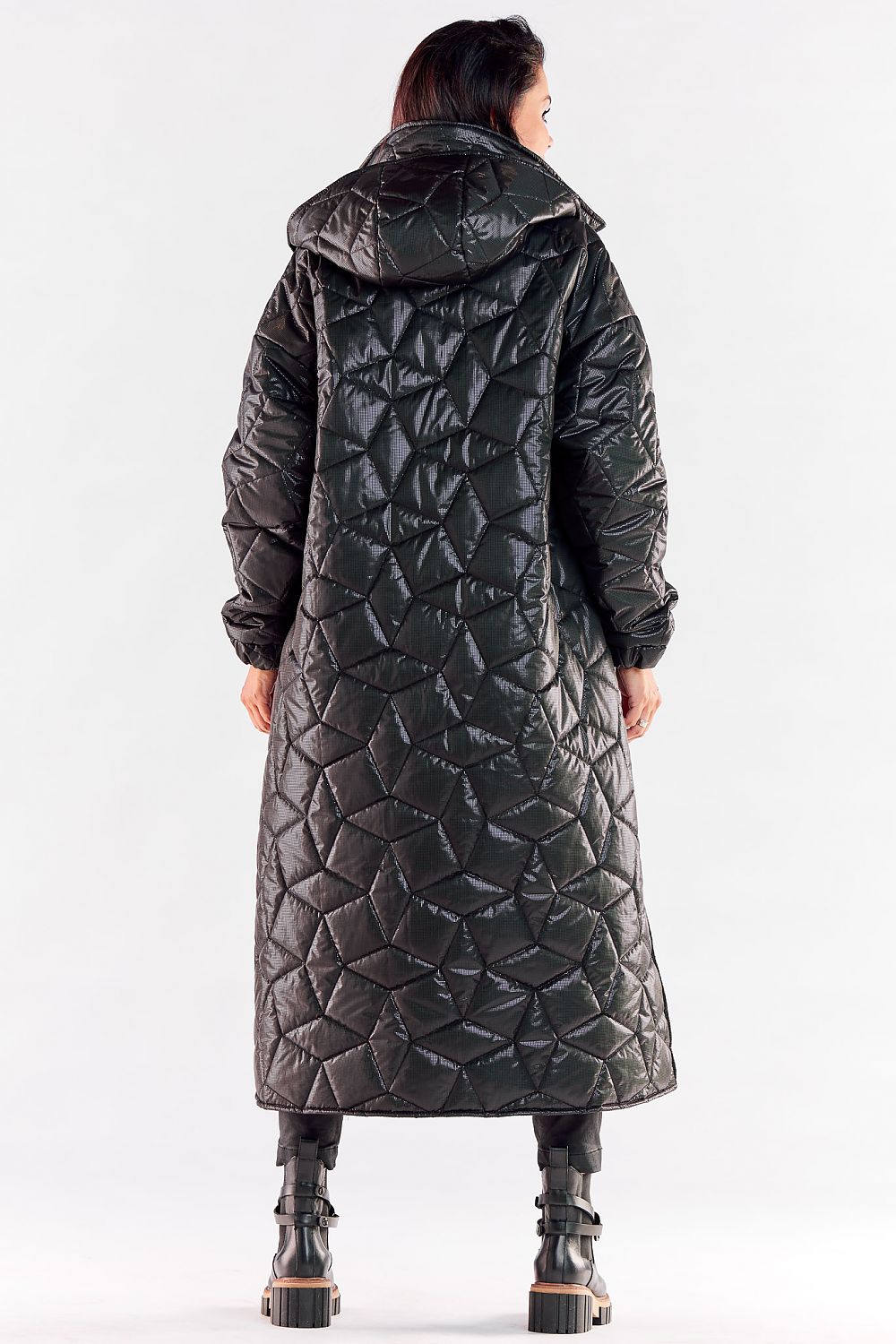 Elegant back view of the luxury long quilted coat showcasing its hood and ribbed sleeve design, embodying sophistication and comfort.