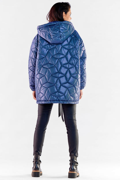 Back view of a fashionable oversized quilted jacket in blue, highlighting the adjustable hood and quilted texture, a must-have for luxury outerwear.