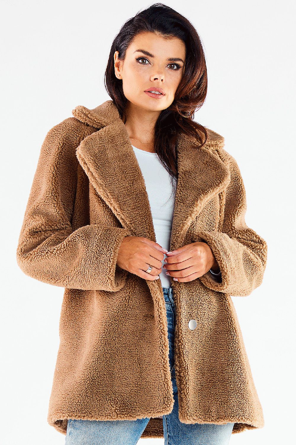 Elegantly styled Awama women's hip-length fur coat in soft brown, featuring decorative buttons and a chic collar, perfect for a luxurious winter outfit.