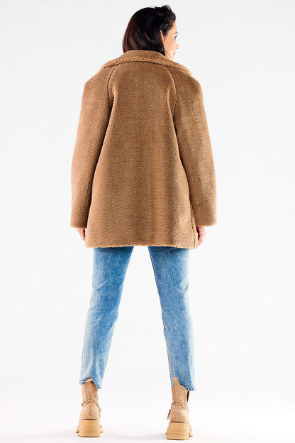 Back view of the exquisite Awama women's fur coat in warm brown, showcasing the plush texture and tailored silhouette, perfect for elegant winter looks.