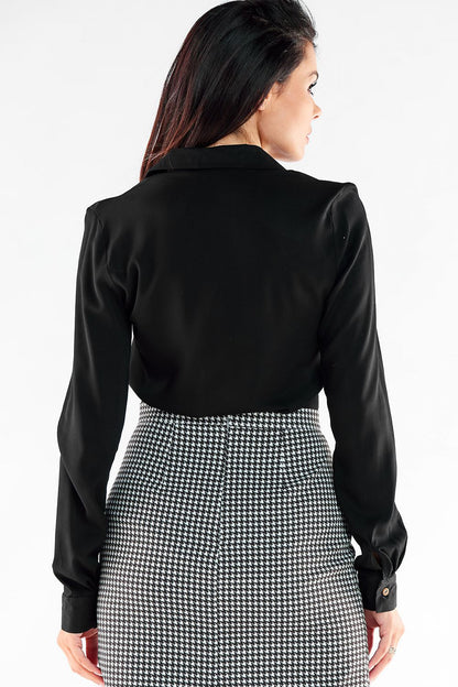 Elegant long sleeve shirt by Awama, featuring a sophisticated black design, displayed from the back, perfect for professional and evening wear.