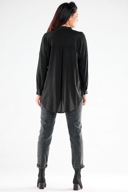 Elegant back view of a black long sleeve buttoned shirt, highlighting its refined design and flowing silhouette.