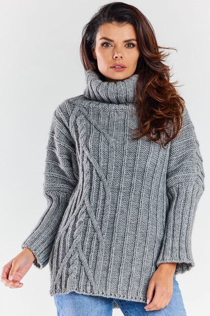 Luxury women's turtleneck sweater in grey, featuring decorative plaid embellishments and stylish side slits, ideal for warm and chic autumn outfits.