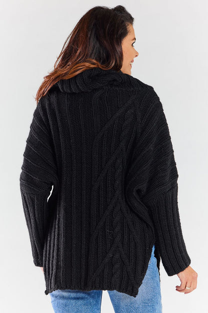 Back view of a luxurious black women's turtleneck sweater, highlighting the rich knit texture and fashionable side slits, ideal for a trendy winter outfit.