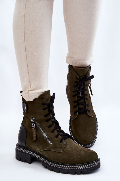 Stylish women's classic suede leather boots featuring a side zipper and flat heel, showcasing an elegant olive green colour paired with chic lacing, designed for comfort and sophistication.