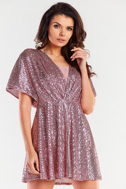 Elegant short evening dress in shimmering rose gold, featuring loose sleeves and a fitted waist, ideal for upscale occasions.