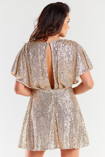 Chic back view of a gold sequin dress with a stylish open back design, highlighting exquisite craftsmanship and luxurious style.