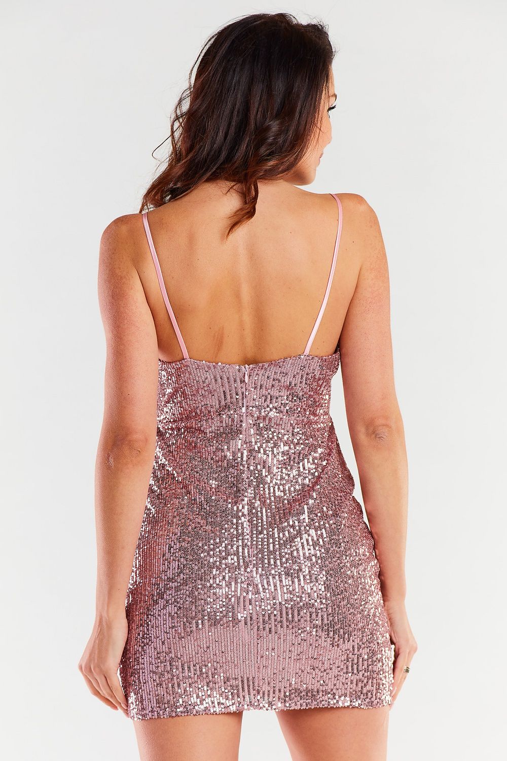 Elegant back view of a luxury heart-shaped neckline evening dress in rose gold, adorned with sequins, highlighting its fitted silhouette and delicate straps.