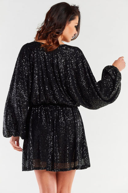 Elegant back view of a black loose evening dress with wide sleeves by Awama, embellished with sequins, perfect for glamorous occasions.