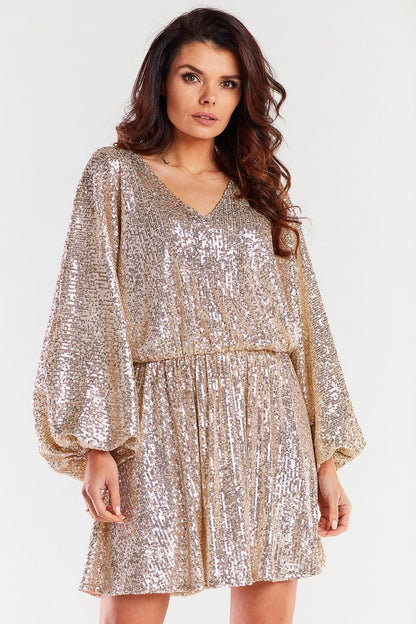 Chic front view of a gold sequin loose evening dress by Awama, featuring a cheeky neckline and wide sleeves, ideal for special events.