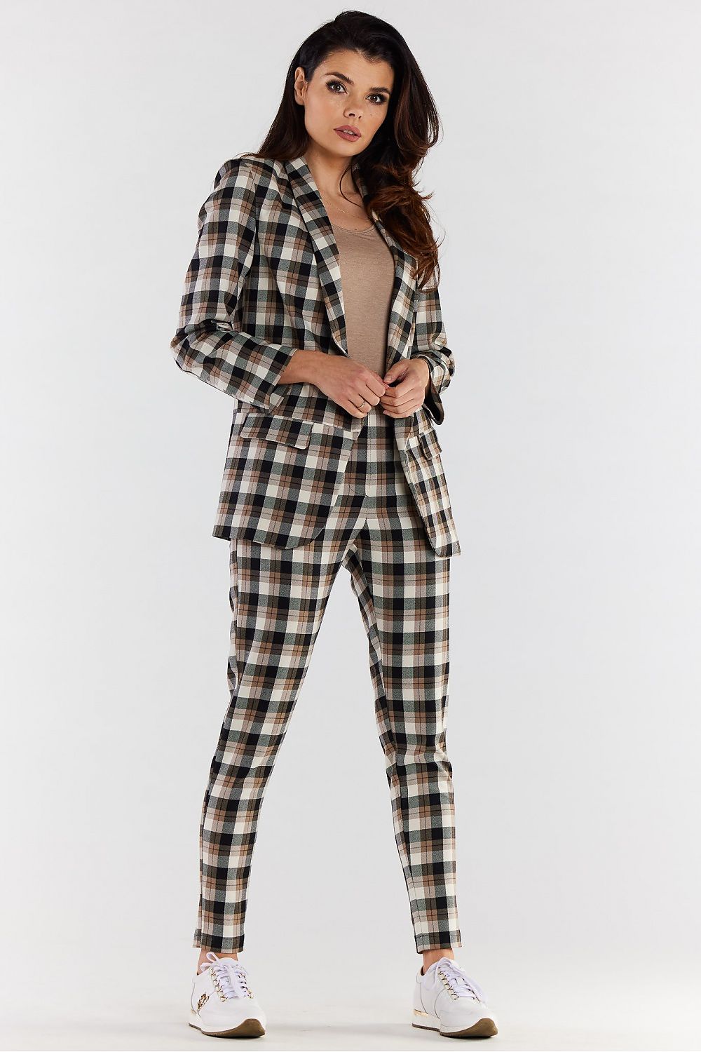 Elegant check jacket by Awama, tailored fit for a sophisticated urban style, showcased with matching plaid trousers and casual white sneakers, ideal for both chic and everyday outfits.