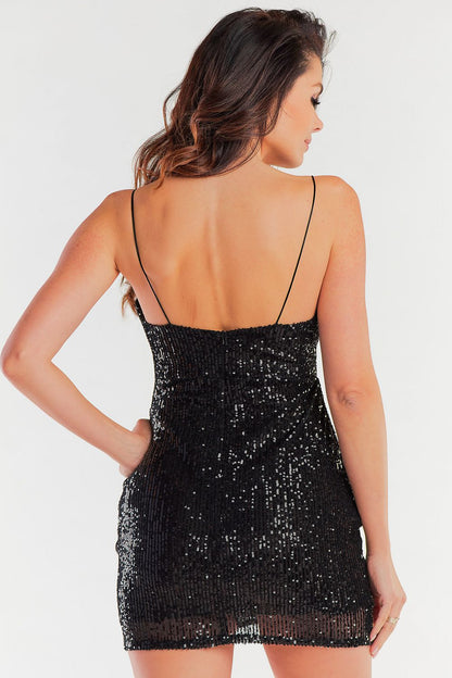 Refined back view of a fitted black evening dress with a deep scoop back, embellished with shimmering sequins, exuding timeless elegance.