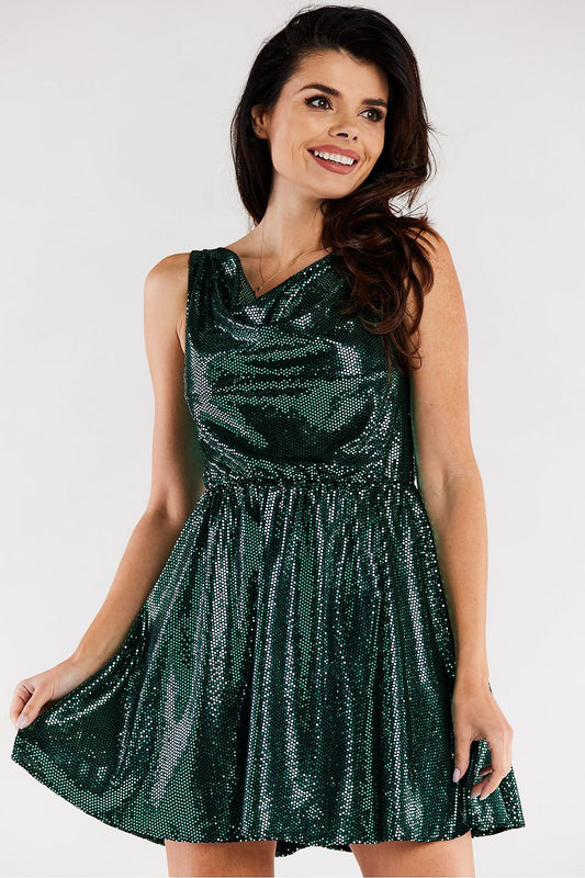 Elegant flared evening dress in rich green hue, featuring a ruffled neckline and shimmering fabric. Showcased on a model with styled hair, exuding sophistication, ideal for special occasions.
