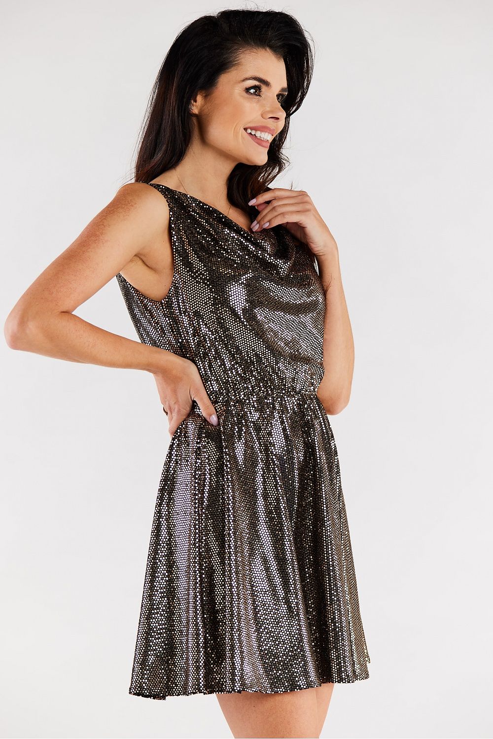 Stylish side view of an elegant evening dress, highlighting the intricate ruffled neckline and flared design, set in a luxurious metallic hue.
